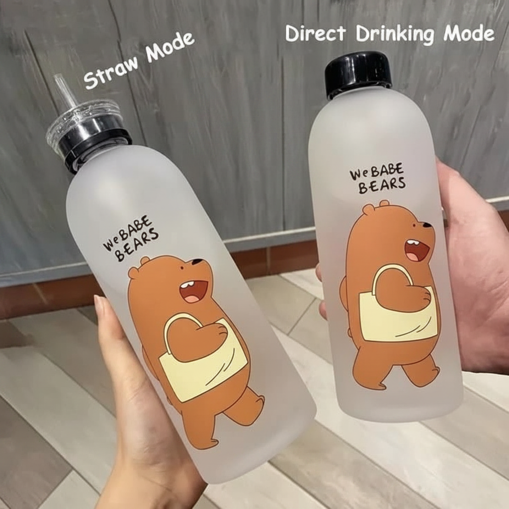 Two water bottles with cartoon bear design and text, one labeled 'Straw Mode' and the other 'Direct Drinking Mode', held by hands against a wooden floor background.