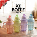 Four colorful ice bottles on a wooden surface with 'Jbi' branding.