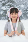 Child wearing pink bunny ear headband with long ears in a snowy background, brand 'Jbi by Smart Deals' visible.