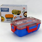 Blue and red lunch box with clear lid in front of a KENDY branded box on a white background