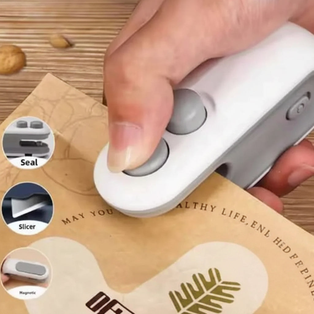 Hand using a white kitchen tool on a piece of paper with 'Jbi by Smart Deals' branding.