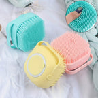 Three silicone cleaning brushes in yellow, pink, and blue on a white background with 'Jbi' branding.