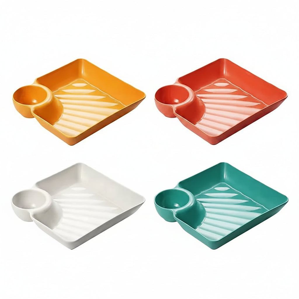 Four colorful trays with divided sections on a white background, featuring the brand 'Jbi'.