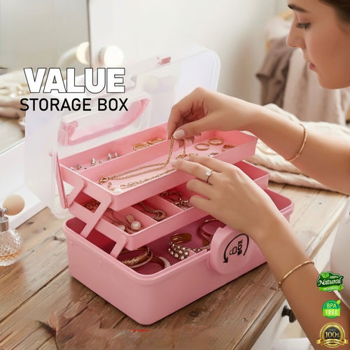 Pink jewelry storage box with a woman organizing jewelry, branded 'Jbi by Smart Deals'.