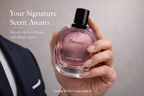 Hand holding a pink perfume bottle labeled 'Zaman' by Rafiero Scent with promotional text on a gray background.